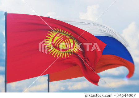 Waving Russian flag and flag of Kyrgyzstan. Closeup view, 3D illustration. Waving Russian flag and flag of Kyrgyzstan. Closeup view, 3D illustration. 74544007