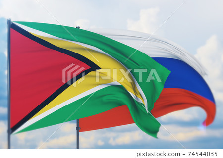 Waving Russian flag and flag of Guyana. Closeup view, 3D illustration. Waving Russian flag and flag of Guyana. Closeup view, 3D illustration. 74544035