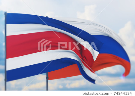 Waving Russian flag and flag of Costa Rica. Closeup view, 3D illustration. 74544154