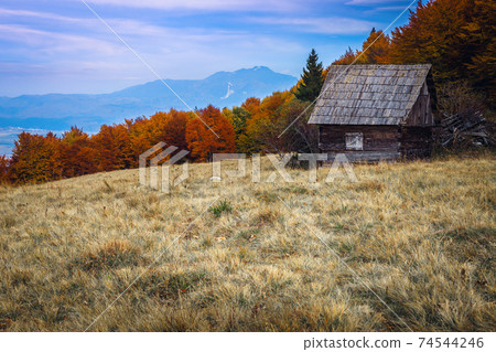Autumn rural scenery and rickety wooden hut on the glade Autumn rural scenery and rickety wooden hut on the glade 74544246