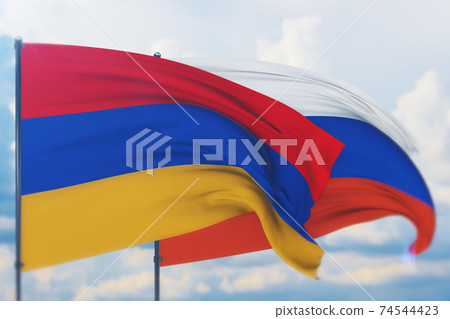 Waving Russian flag and flag of Armenia. Closeup view, 3D illustration. 74544423