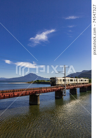 Scenery of JR Nippou Line and Sakurajima Aira City, Kagoshima Prefecture Scenery of JR Nippou Line and Sakurajima Aira City, Kagoshima Prefecture 74547327