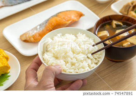 Men eating Japanese food 74547891
