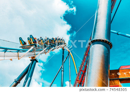 Roller Coaster in funny amusement park Roller Coaster in funny amusement park 74548305