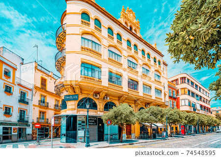 Downtown of the city Seville - is the capital and largest city o Downtown of the city Seville - is the capital and largest city o 74548595