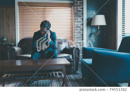 Middle businessman worried 74551382