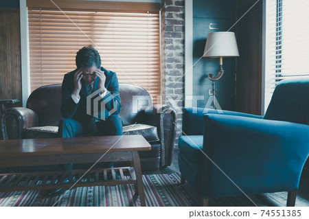 Middle businessman worried 74551385