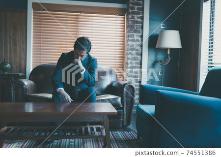 Middle businessman worried Middle businessman worried 74551386