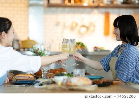 A woman enjoying a home party 74555206