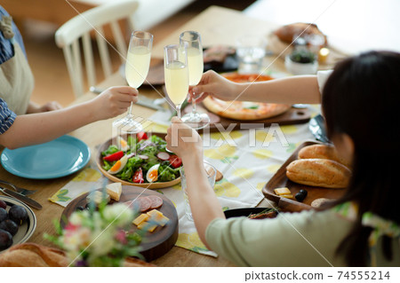 A woman enjoying a home party 74555214