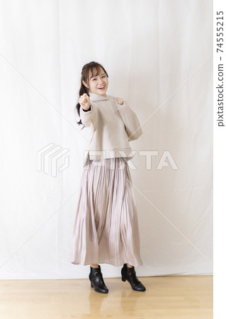 Cute female student / young OL posing with white background 74555215