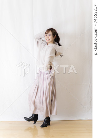 Cute female student / young OL posing with white background 74555217