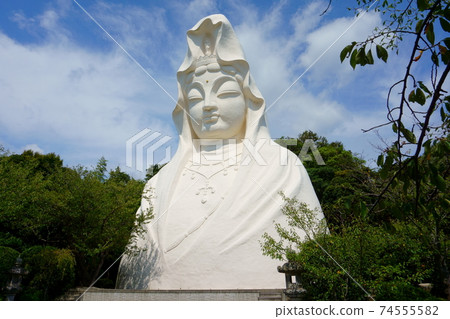 Kamakura, Kanagawa Prefecture Japan. Ofuna-Kannon-ji Temple. The serene face that peers over the hillside Kamakura, Kanagawa Prefecture Japan. Ofuna-Kannon-ji Temple. The serene face that peers over the hillside 74555582