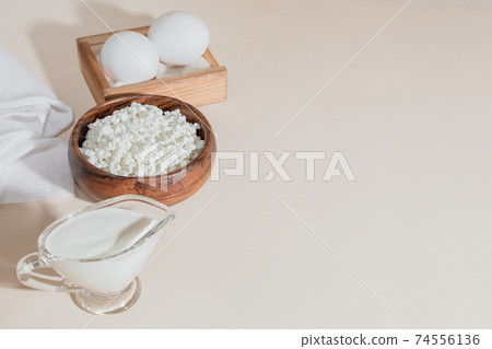 Food is a source of calcium, magnesium, protein, fats, carbohydrates, balanced diet. Dairy products on the table: cottage cheese, sour cream, milk, chicken egg, contain casein, albumin, globulin, free Food is a source of calcium, magnesium, protein, fats, carbohydrates, balanced diet. Dairy products on the table: cottage cheese, sour cream, milk, chicken egg, contain casein, albumin, globulin, free 74556136