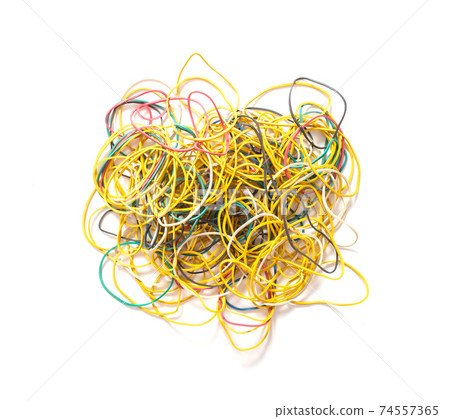 Many multi-colored rubber bands for money on a white background, isolate. Stationery concept Many multi-colored rubber bands for money on a white background, isolate. Stationery concept 74557365