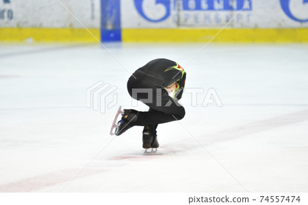 Boy figure skating 74557474