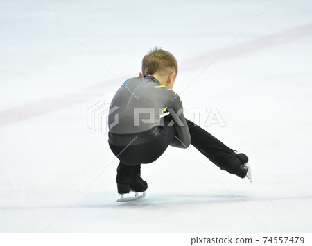 Boy figure skating Boy figure skating 74557479