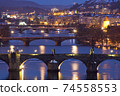 Prague - bridges over Vltava river at dusk. 74558553