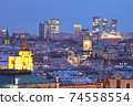 Prague - spires of the old town and office high-rises at dusk 74558554