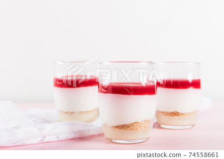 Raspberry dessert from whipped white chocolate mousse and raspbe 74558661