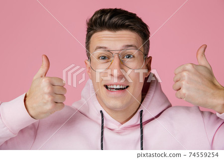 Caucasian man's portrait isolated on pink studio background with copyspace Caucasian man's portrait isolated on pink studio background with copyspace 74559254