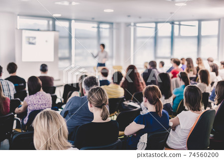 Speaker giving presentation on business conference. 74560200