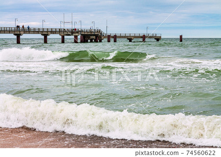 Pier on the Baltic Sea coast in Goehren on the island Ruegen, Germany Pier on the Baltic Sea coast in Goehren on the island Ruegen, Germany 74560622