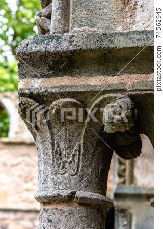 Romanesque capital in medieval abbey in Brittany Romanesque capital in medieval abbey in Brittany 74562945