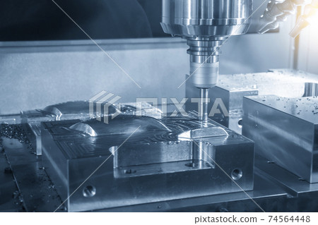 The CNC milling machine rough cutting the injection mold parts . The CNC milling machine rough cutting the injection mold parts . 74564448