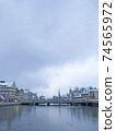 Winter views from the old town of Zurich, Switzerland, the Limmat river and the Mühle pedestrian bridge 74565972