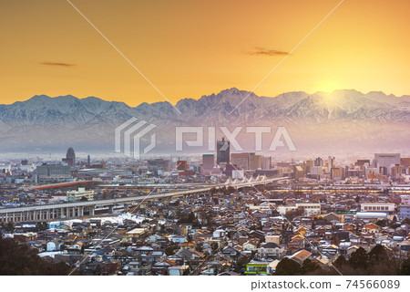Toyama, Japan Skyline with Tateyama Mountain 74566089