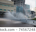Fountain in the Twin Towers Square in Kuala Lumpur, Malaysia 74567248