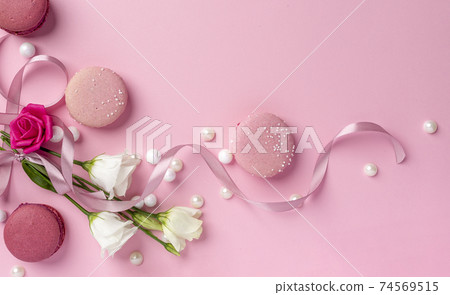 international women's day concept created from white and pink roses, ribbon and pearls on a blank clear pink background international women's day concept created from white and pink roses, ribbon and pearls on a blank clear pink background 74569515