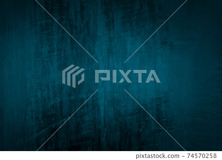 Vintage grunge blue concrete texture studio wall background with vignette. Vintage grunge blue concrete texture studio wall background with vignette. 74570258