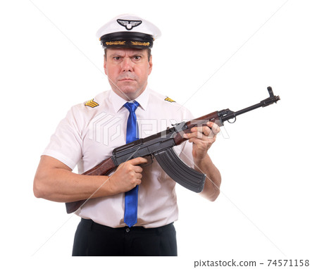 The pilot is armed with tommy gun, isolated on white background. The pilot is armed with tommy gun, isolated on white background. 74571158