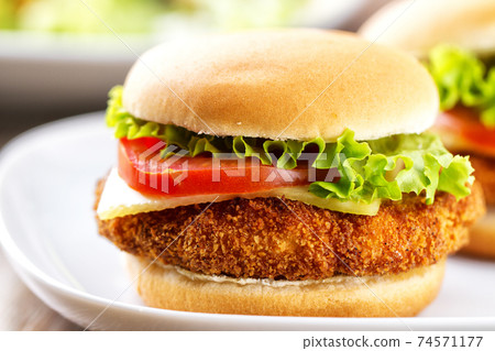 Mini Crispy Chicken Burger with Lettuce Tomato and Cheese. 74571177