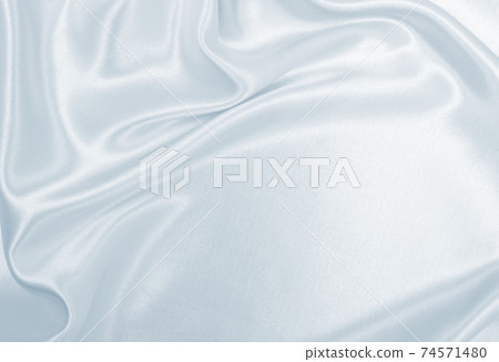 Smooth elegant grey silk or satin luxury cloth as wedding background. Luxurious Christmas background or New Year background design Smooth elegant grey silk or satin luxury cloth as wedding background. Luxurious Christmas background or New Year background design 74571480