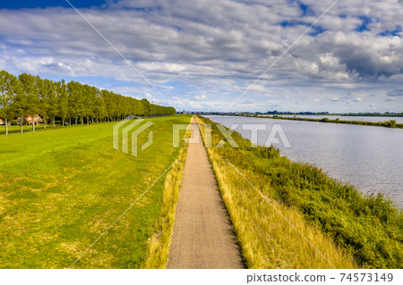Aerial view of Dike and canal 74573149