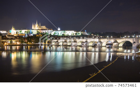 Pargue charles bridge and prague castle by night reflections river Pargue charles bridge and prague castle by night reflections river 74573461