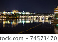 Pargue charles bridge and prague castle by night reflections river 74573470