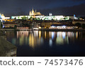 Pargue charles bridge and prague castle by night reflections river 74573476