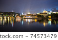 Pargue charles bridge and prague castle by night reflections river 74573479