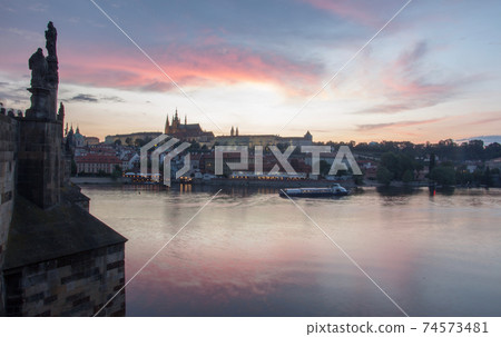 Prague charles bridge sunset view with castle in backgorund 74573481