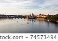 Charles bridge prague sunset light beautiful river water 74573494