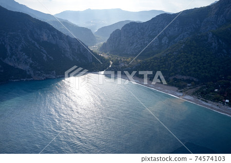 Aerial view of sea bay and mountains. 74574103