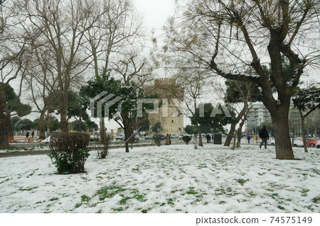 Thessaloniki, Greece Medea front hits with heavy snowfall city center, with crowd moving. Thessaloniki, Greece Medea front hits with heavy snowfall city center, with crowd moving. 74575149