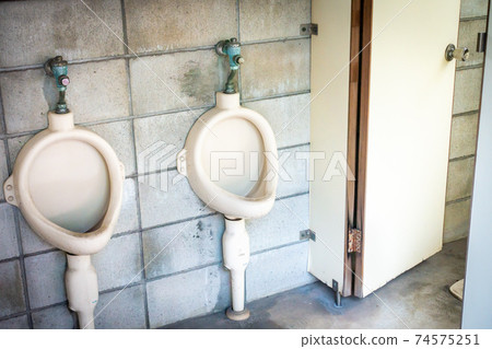 Image of a dirty public toilet taken in Japan 74575251
