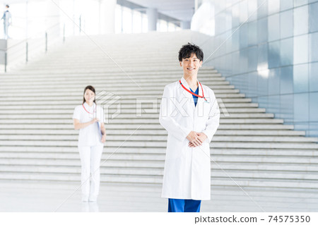 Young doctor working in a hospital 74575350