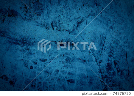 Vintage grunge blue concrete texture studio wall background with vignette. Vintage grunge blue concrete texture studio wall background with vignette. 74576730