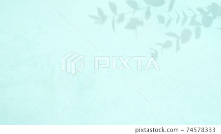 Shadows of branches falling on a refreshing light blue wall Image-like background-there are multiple variations 74578333
